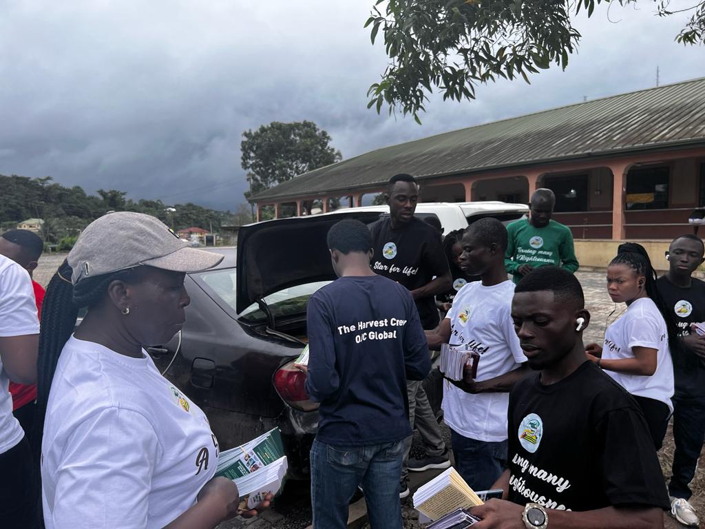 Gathered with outreach materials before a school programme